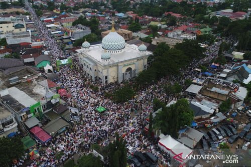 Haul Guru Sekumpul Dan Penerapan Ekonomi Syariah Di Kalimantan Selatan