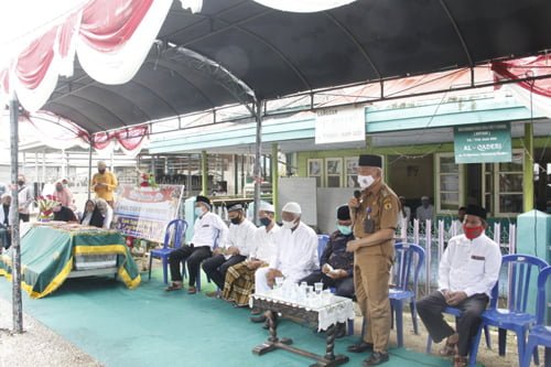 Serah Terima Jenazah Almarhum KH Rizali M Noor Kepada Keluarga <br>Chairansyah Sambut Kedatangan Bupati Bolaang Mongondow Selatan 1 hal 2 HST 1 3 klm 1