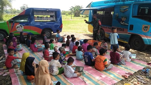 Dansatgas TMMD Ke-112 Kodim HST: Membaca Dapat Meningkatkan Kemampuan Otak Anak