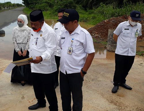 hal 12 Tanbu 25 klm 12