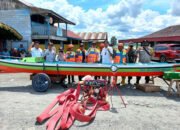 BPBD Tapin Serahkan Hibah Perahu Motor dan Mesin Pemadam Kebakaran