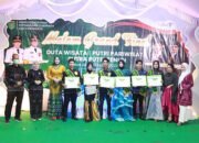 Tahta Mutia Raih Gelar Putri Pariwisata Tanbu