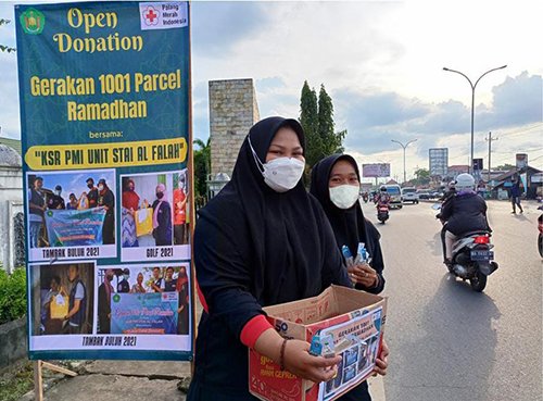 KSR PMI STAI Al Fallah Gelar 1001 Parcel Kebahagiaan 1 Hal 10 3 Klm PMI Parcel