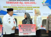 Plt Bupati HSU Serahkan Bantuan Langsung Tunai ke KPM