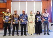 Bank Kalsel Tandatangani Implementasi Aplikasi Penerima Setoran BPIH