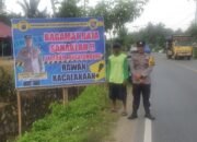 Polsek LAS Pasang Baliho Himbauan bagi Pengguna Jalan