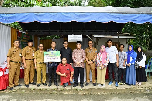 Dana Hibah Diserahkan ke KNPI, KONI dan NPC 1 Hal 12 HSS 3 klm 5