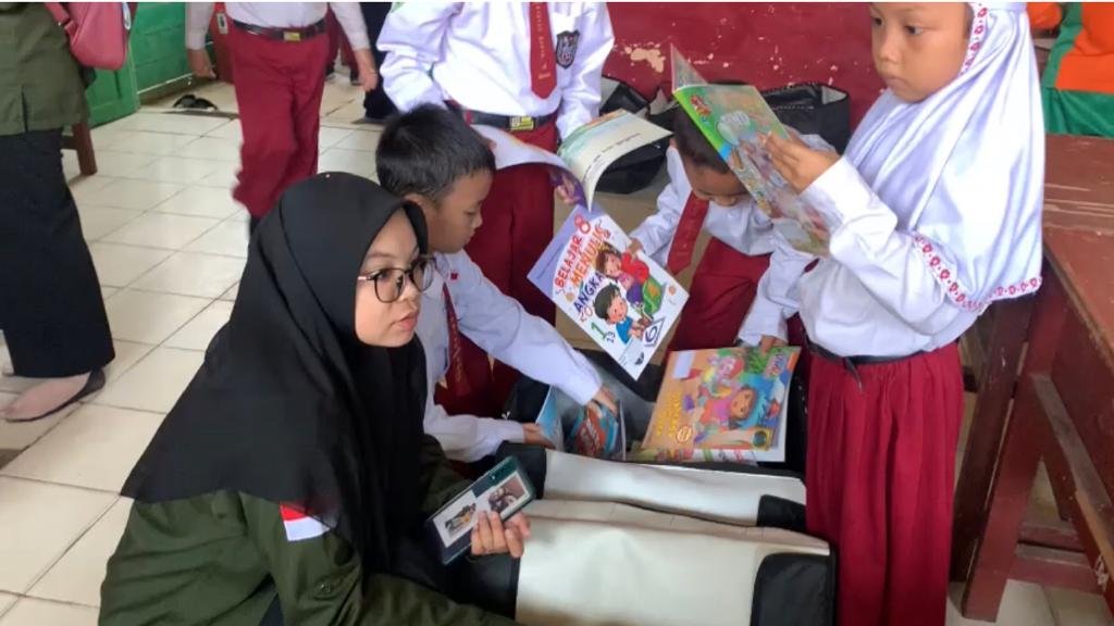 Dispersip Kalsel Bersama<br>Tim Pusling Kerja Sama dengan Kampus Mengajar untuk Tingkatkan Minat Baca 1 IMG 20230606 WA0015