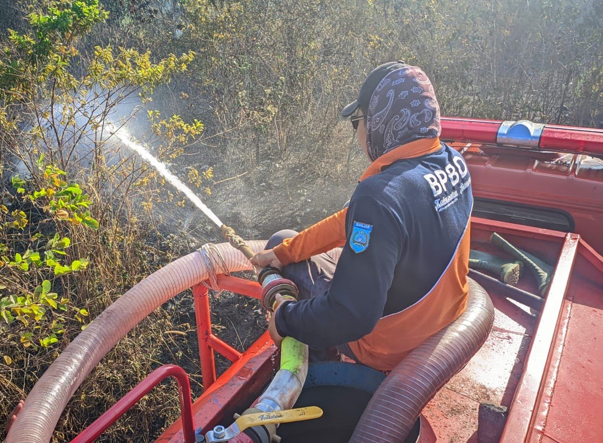 1 TANGANI KARHUTLA 2 1