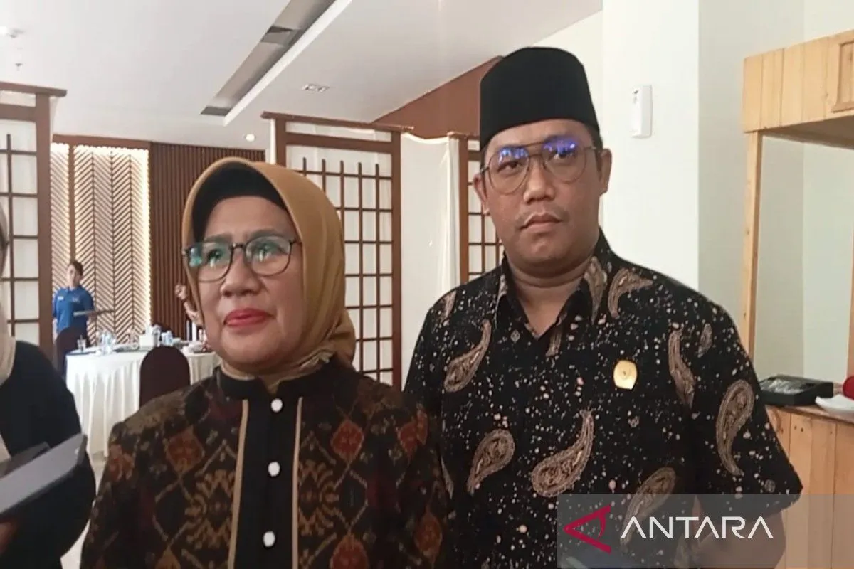 Hal 10 3 KLm Ketua KPU Kota Banjarmasin Hj Rusnaillah