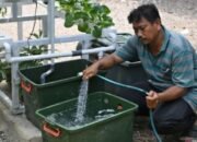 Mendekatkan Air Bersih ke Genggaman Warga 18 Mendekatkan Air Bersih ke Genggaman Warga