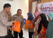 Polres HSS Bagikan 220 Paket Sembako ke Masyarakat Kurang Mampu