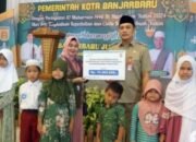 Bank Kalsel Batu Peralatan Sekolah Anak Yatim di Banjarbaru