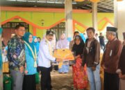 Bela Desa di Asri Mulya Pemkab Tala Berikan Pelayanan dan Salurkan Bantuan
