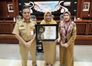 Pemkab Tanah Laut Raih Predikat Menuju Informatif
