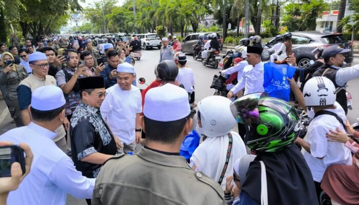 Pemko Banjarmasin Gandeng Bank Kalsel Sambut Jemaah Haul Guru Sekumpul Bagikan Ribuan Konsumsi 2 IMG 20250106 WA0016