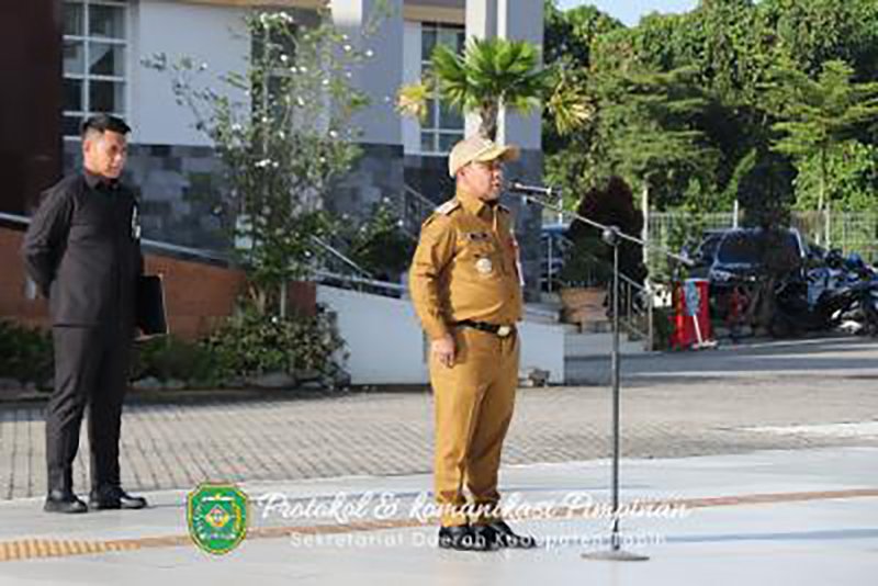 Perdana Pimpin Apel Gabungan Bupati Tegaskan Sinkronisasi Program Nasional 1 Hal 12 Tapin 35 klm 1