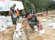 Satgas TMMD ke-124 Genjot Pembangunan Jalan, Pondasi di Titik Nol Dimulai 10 Satgas TMMD ke-124 Genjot Pembangunan Jalan, Pondasi di Titik Nol Dimulai