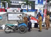 Sambut HUT RI-Harjad Banjar, Diskominfostandi Bagikan Bendera