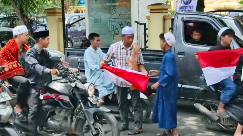 Sambut HUT RI ke-80, Anggota DPR RI Muhammad Rofiqi Bagikan Ribuan Bendera Merah Putih 1 IMG 20250808 WA0032 e1754641750723