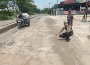 Lapisan Semen Tutupi Jalan di Banjarmasin, Satlantas : Bahaya bagi Pengendara