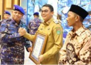 Bupati Tanbu Terima Piagam Penghargaan Pemberian Hibah Bangunan Markas Unit Patroli Muara Bunati