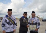 Bupati HM Rusli Irup Upacara HUT ke-80 PGRI dan HGN 2025 Tingkat Kalsel