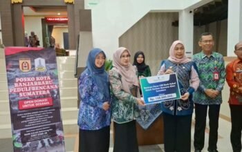 Pemko Banjarbaru Salurkan Bantuan Kemanusiaan untuk Korban Banjir di Sumatra 6 Hal 6 3 KLM BJB 1 6