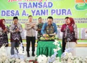 Wabup Tapin Ajak Warga Perkuat Gotong Royong di HUT ke-57 Desa A. Yani Pura