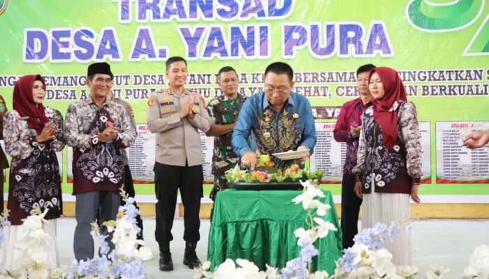 Wabup Tapin Ajak Warga Perkuat Gotong Royong di HUT ke-57 Desa A. Yani Pura