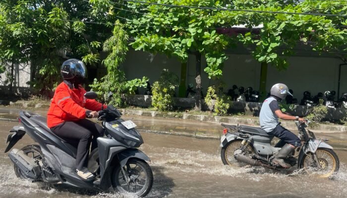 Tips #Cari_Aman dari Honda Trio Motor agar Tetap Aman saat Jalan Tergenang
