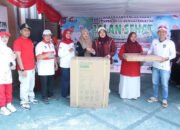 Hj Tata Meriahkan Jalan Sehat HUT ke-81 RI di Kandangan Barat