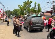 Polres HST Bagikan Bendera Merah Putih Kepada Masyarakar